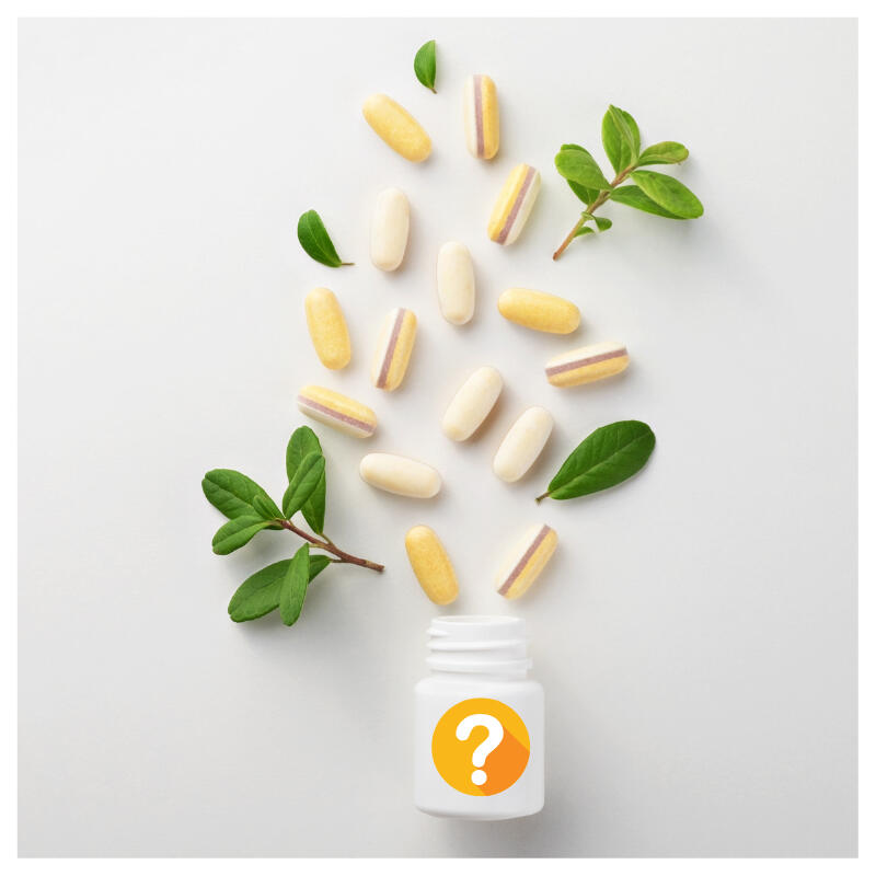 A bottle and supplements spread out over a bottle Natural supplement capsules. Memory Fuel clean creatine brain supplement ingredients